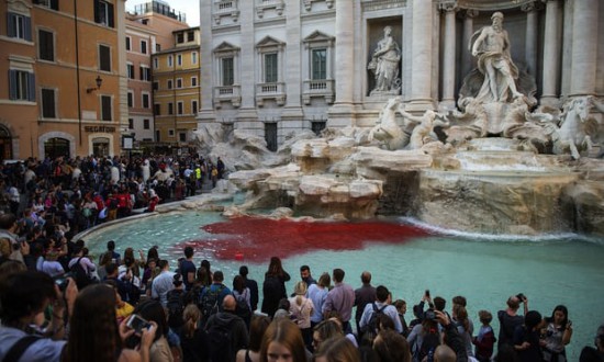  The blood-red dye was poured into the Trevi by public-artist Graziano Cecchini. Photograph: Antonio Masiello/Getty Images